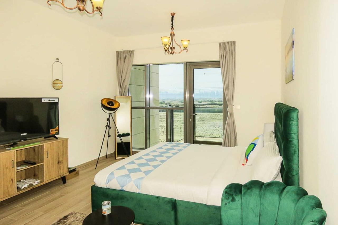 Oyo 860 Studio Apartment, Maya Tower 4, Jumeirah Village Triangle Dubái Exterior foto
