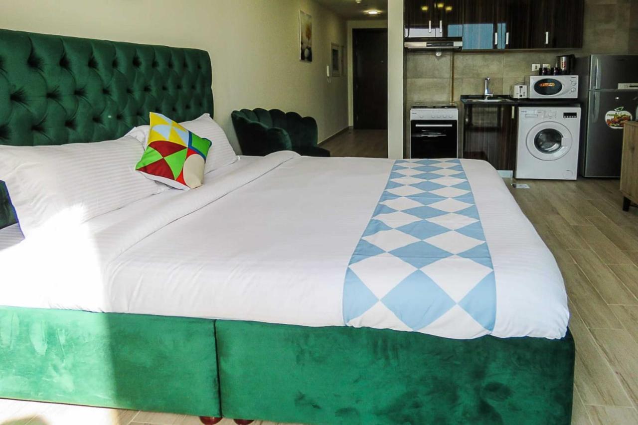Oyo 860 Studio Apartment, Maya Tower 4, Jumeirah Village Triangle Dubái Exterior foto