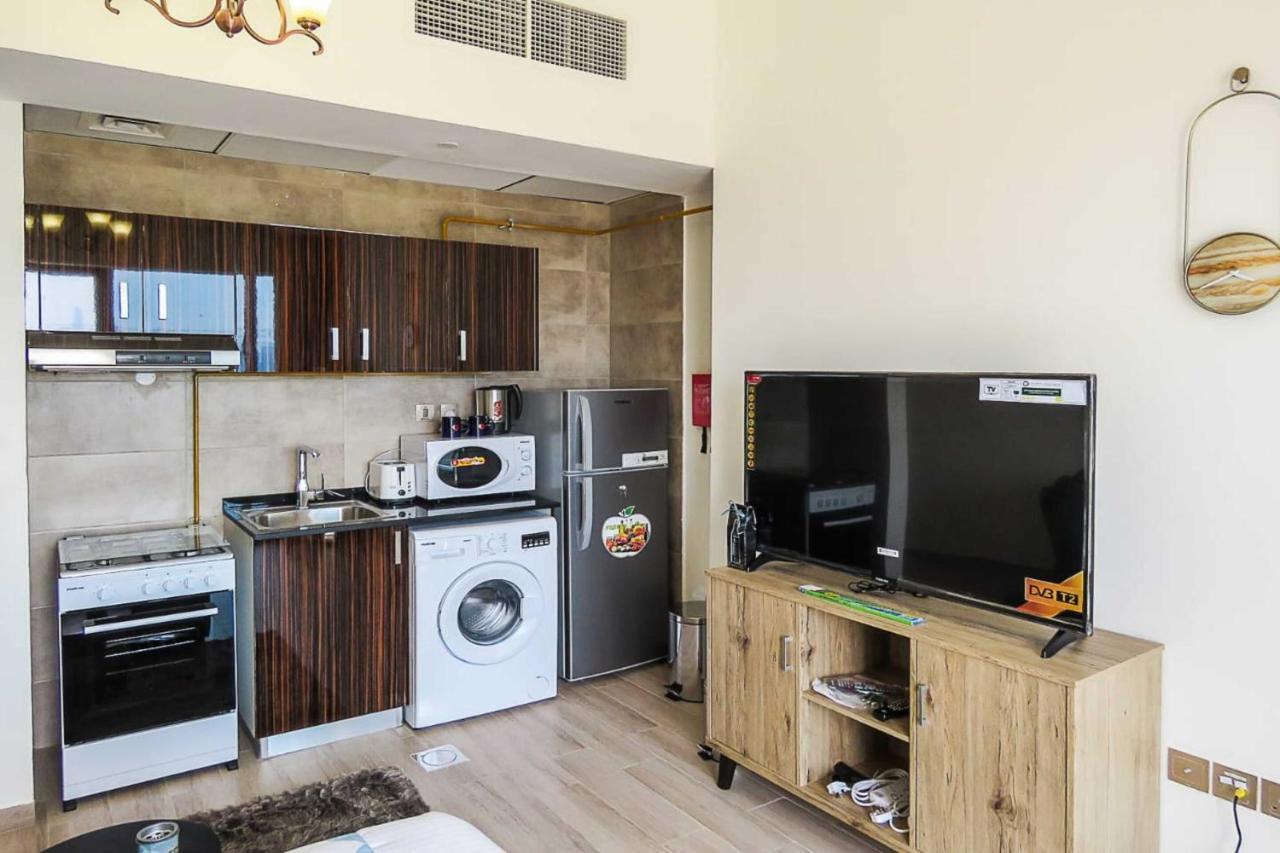 Oyo 860 Studio Apartment, Maya Tower 4, Jumeirah Village Triangle Dubái Exterior foto