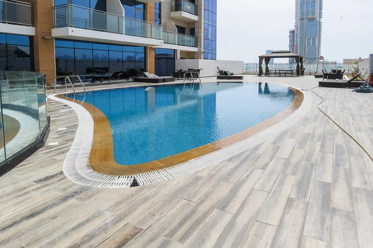 Oyo 860 Studio Apartment, Maya Tower 4, Jumeirah Village Triangle Dubái Exterior foto